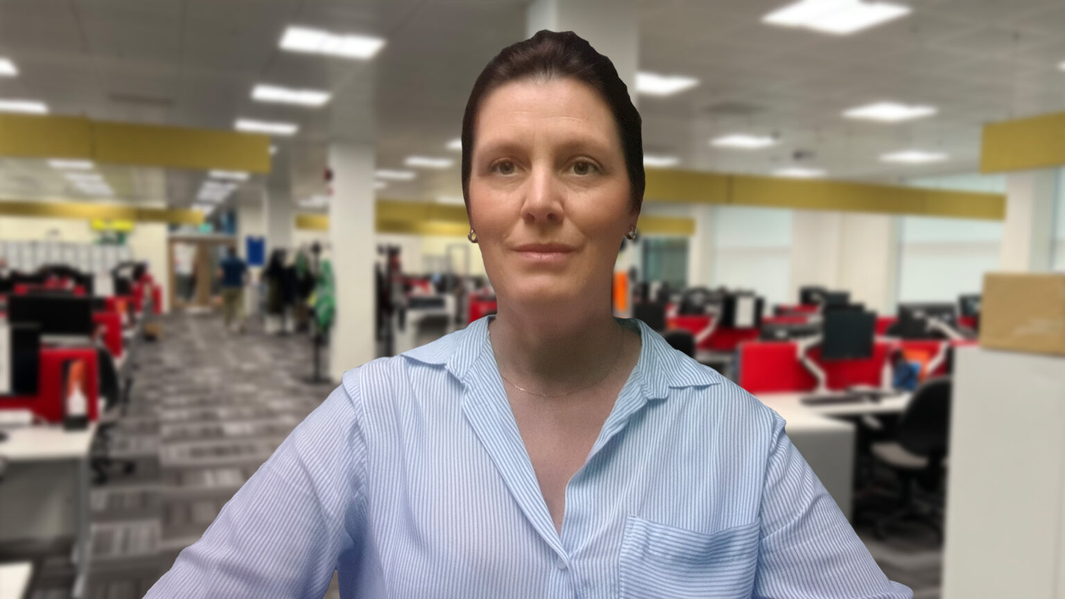 Female Home Office Staff member Sam in an office setting