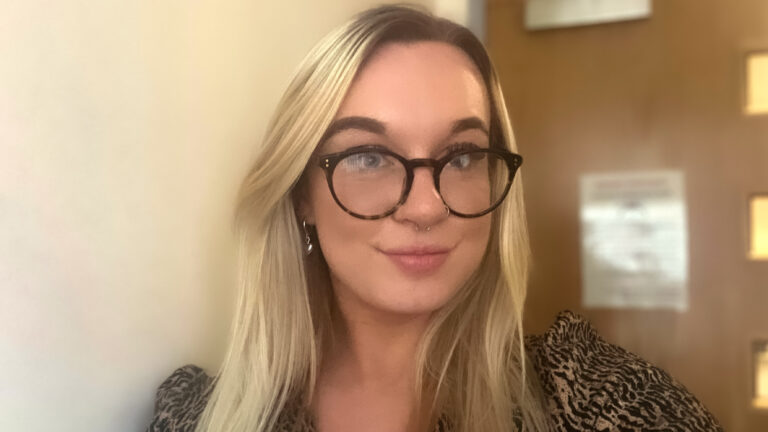 Photo of Abbie, part of the Change of Address Team at the Home Office.