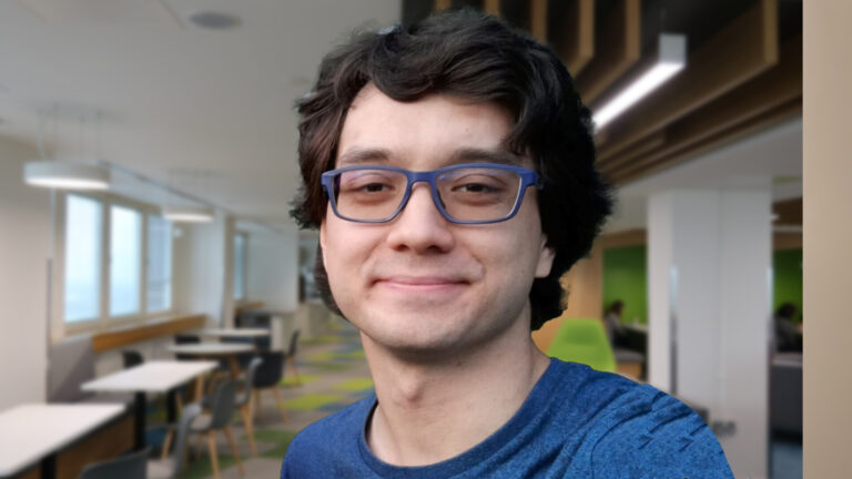 Photo of August, part of the Data Analytics team at the Home Office.
