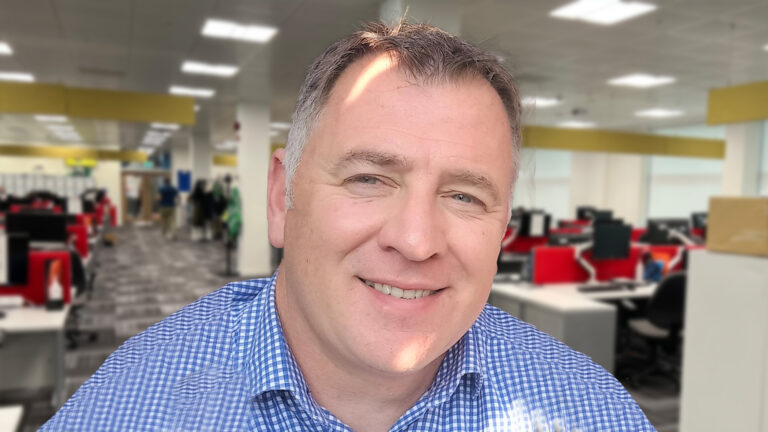Photo of Des, a Home Office employee.