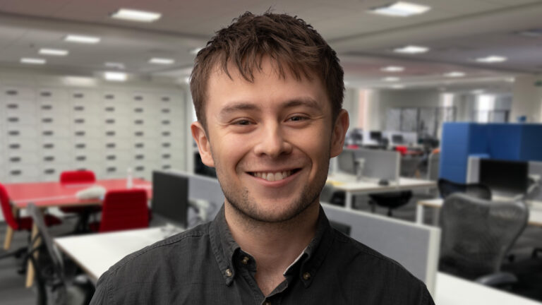 Photo of Tom, a Passport Examiner at the Home Office.