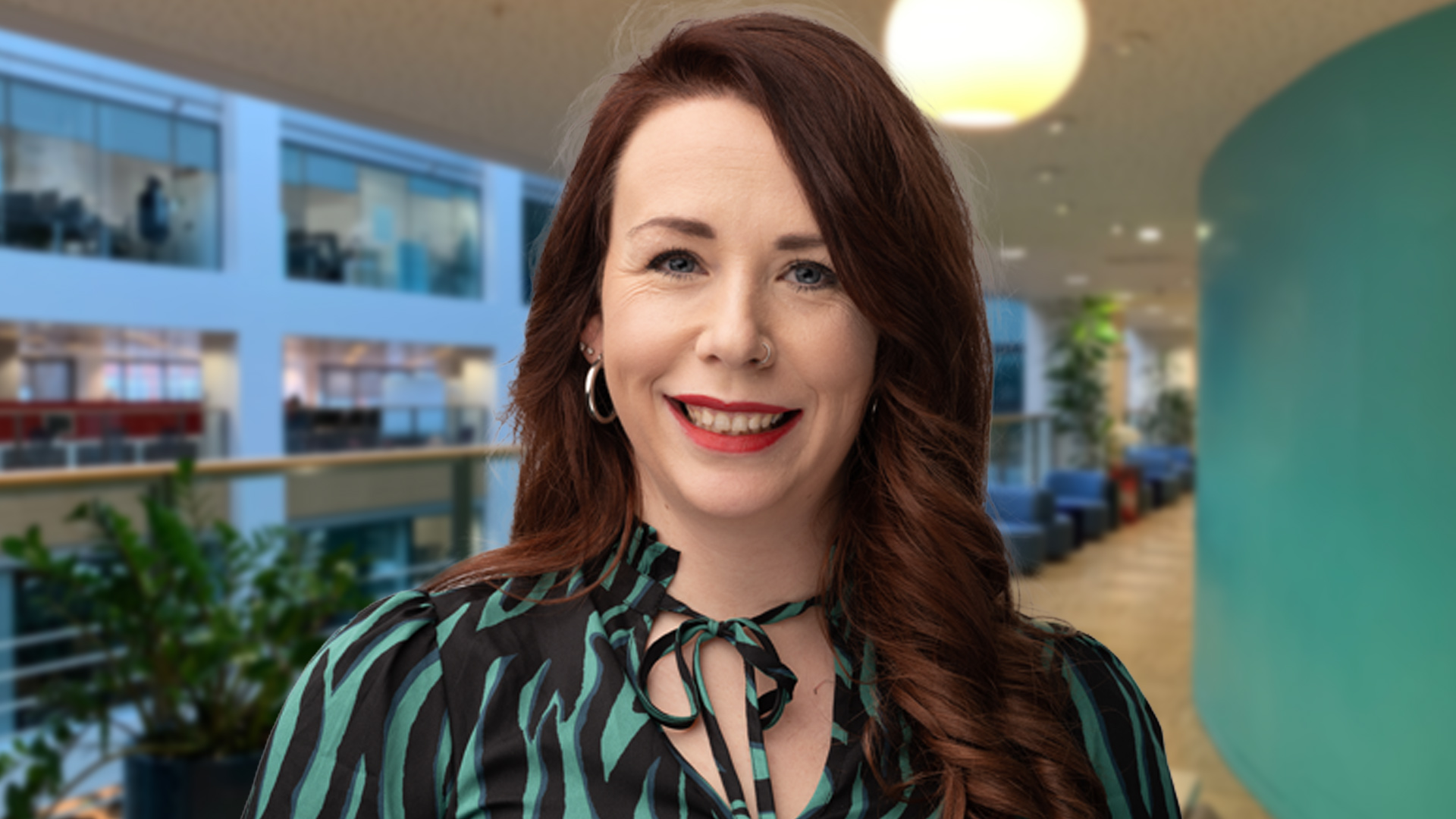 Photo of Lydia, an Interaction Designer at the Home Office.