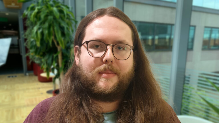 Photo of Maxwell, a Visas & Citizenship Officer at the Home Office.