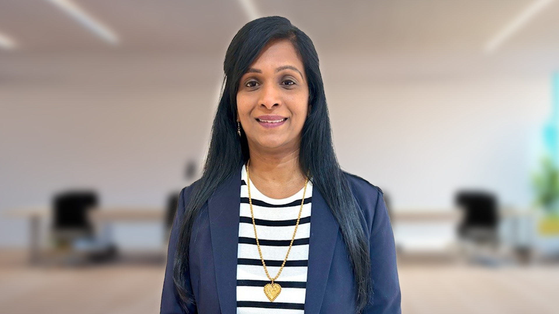Photo of Christina, who works in an IT Operational Service Delivery role at the Home Office.