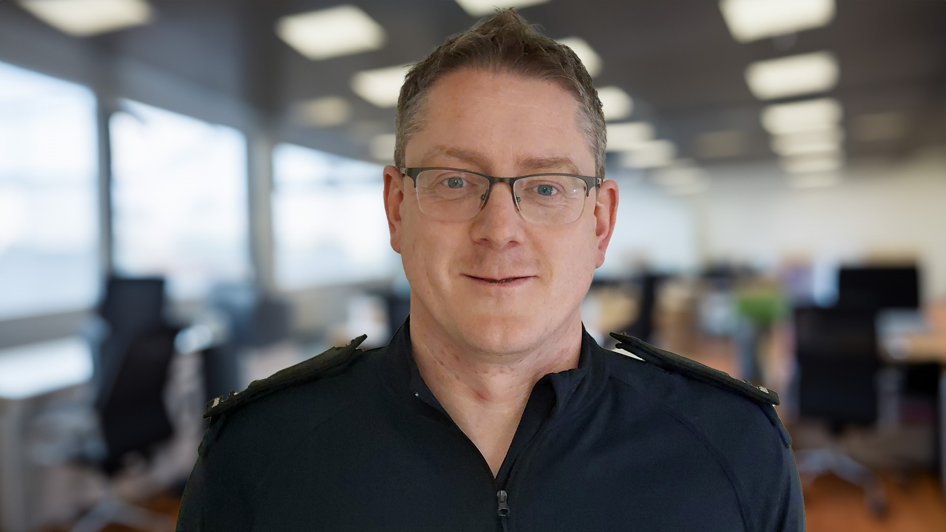 Photo of Derek, an Immigration Enforcement Officer.